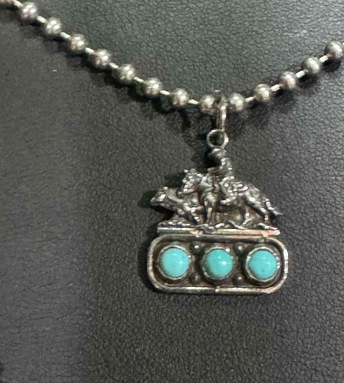 Cow horse on 3 turquoise