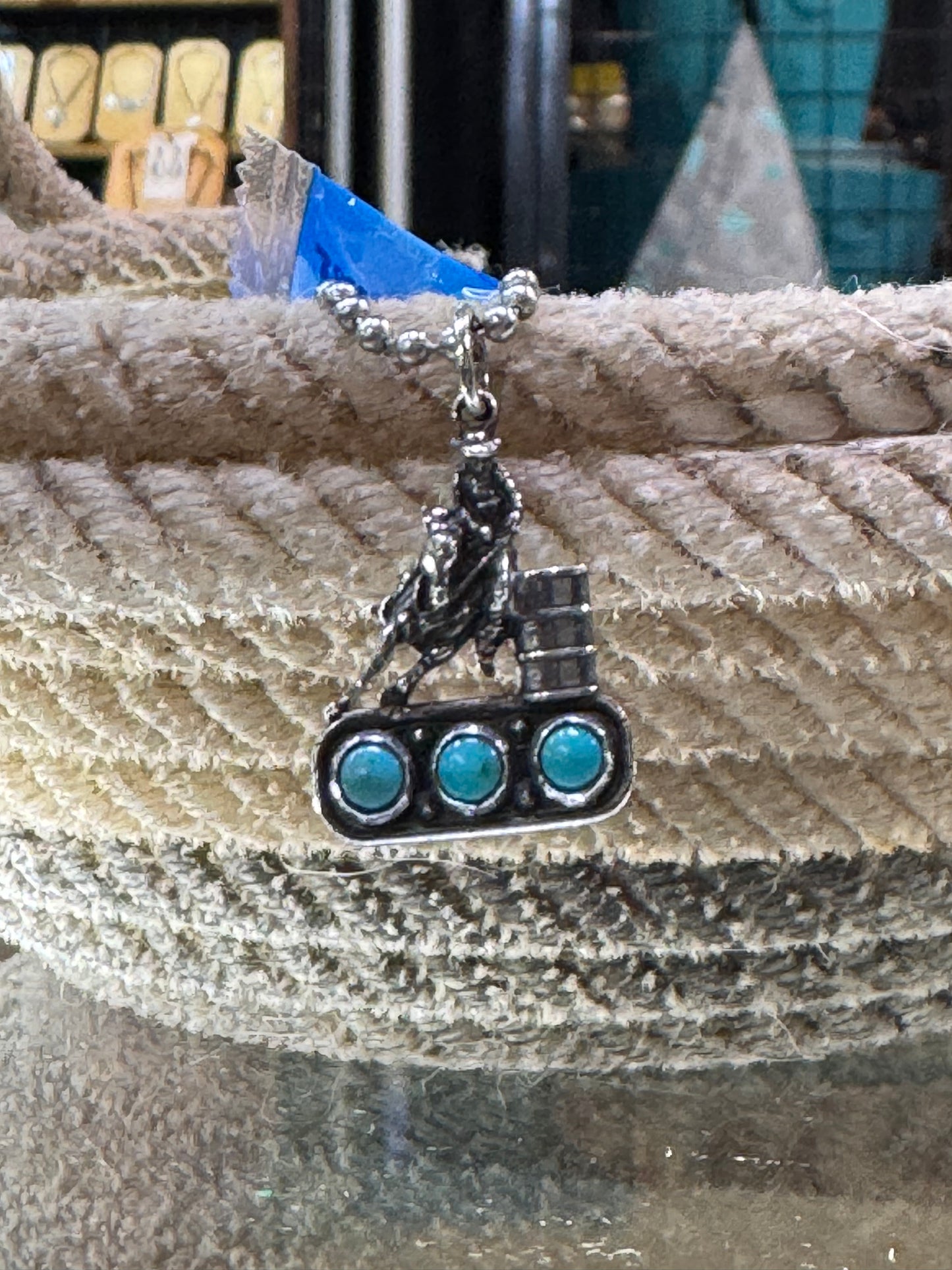 Barrel racer on 3 turquoise