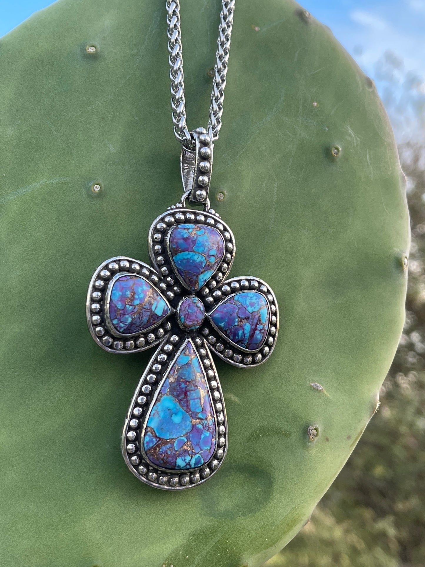Guitar Pick turquoise cross