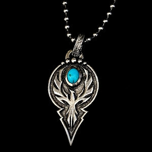 sterling silver pendant with an edgy Phoenix design wrapped around an 8mm x 10mm oval Genuine Kingman turquoise stone from the Kingman Mines in Kingman, AZ. This pendant measures 2" long by 1" wide.