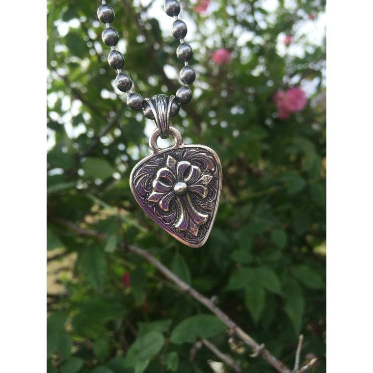 Roman cross guitar pick