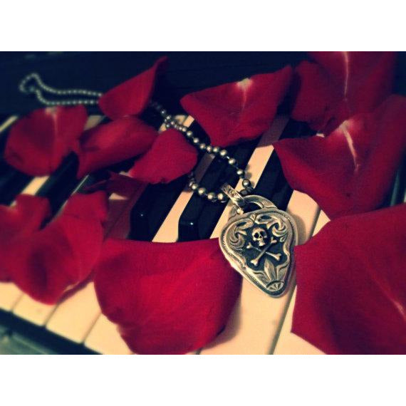 Rebel Guitar Pick Pendant