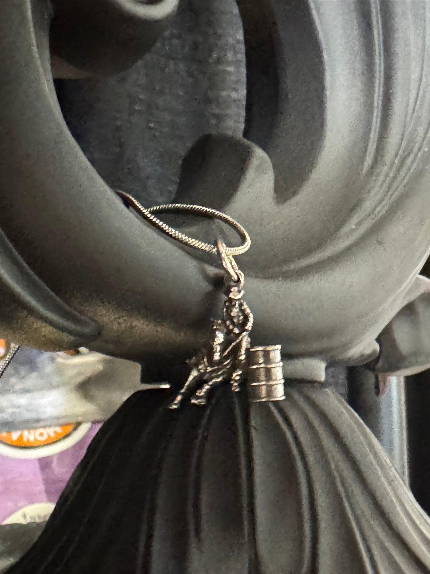 Barrel racer pendant, chain included.