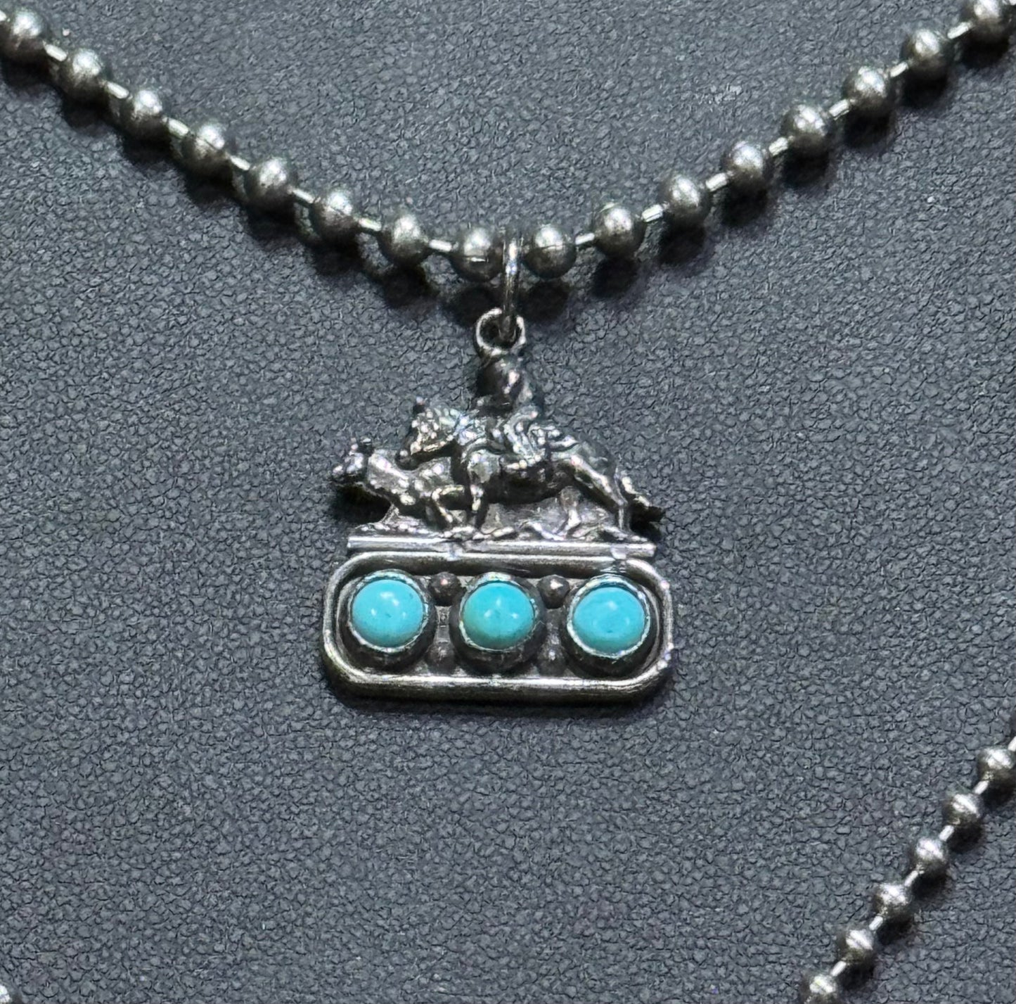 Cow horse on 3 turquoise