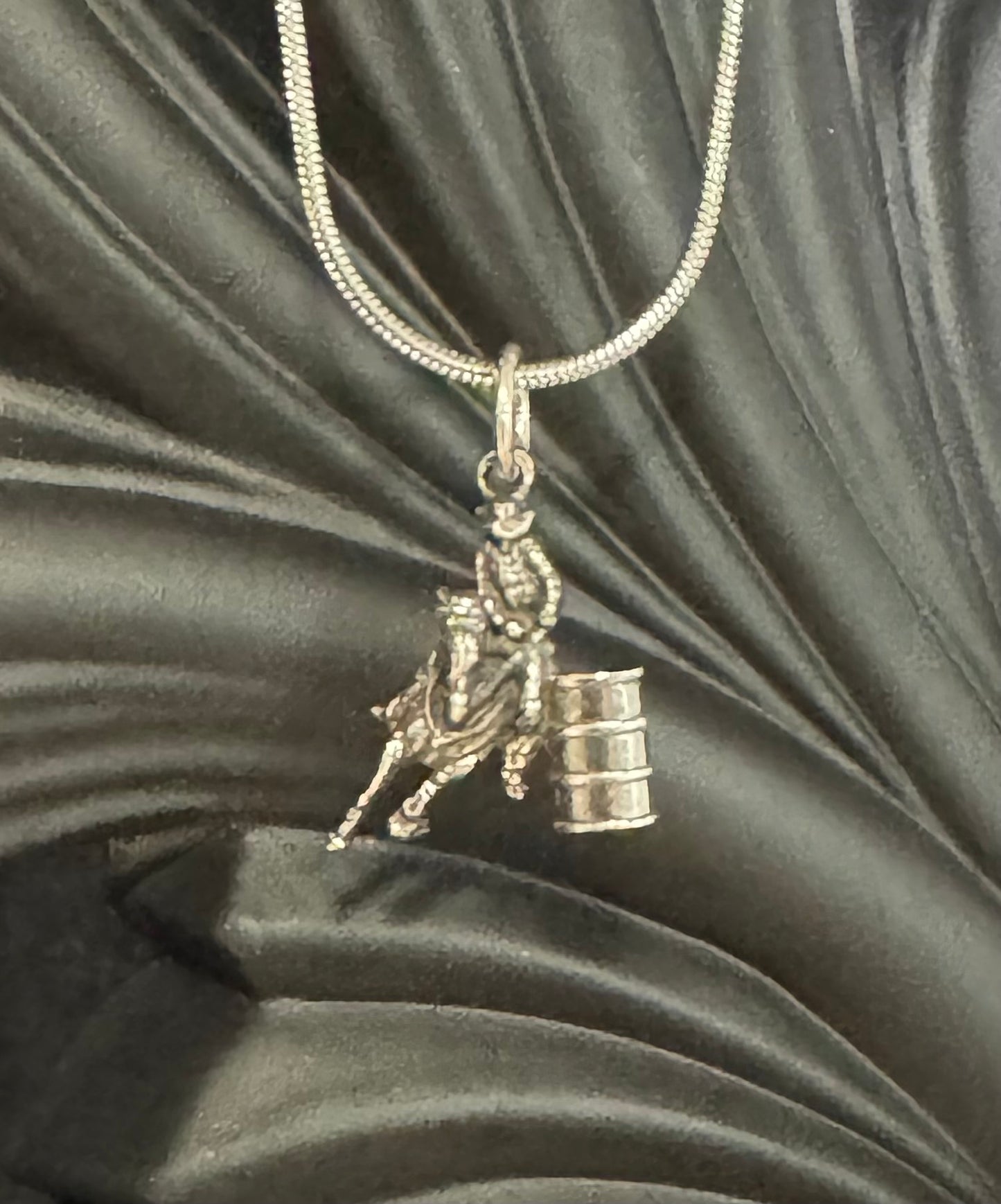 Barrel racer pendant, chain included.