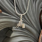 Barrel racer pendant, chain included.