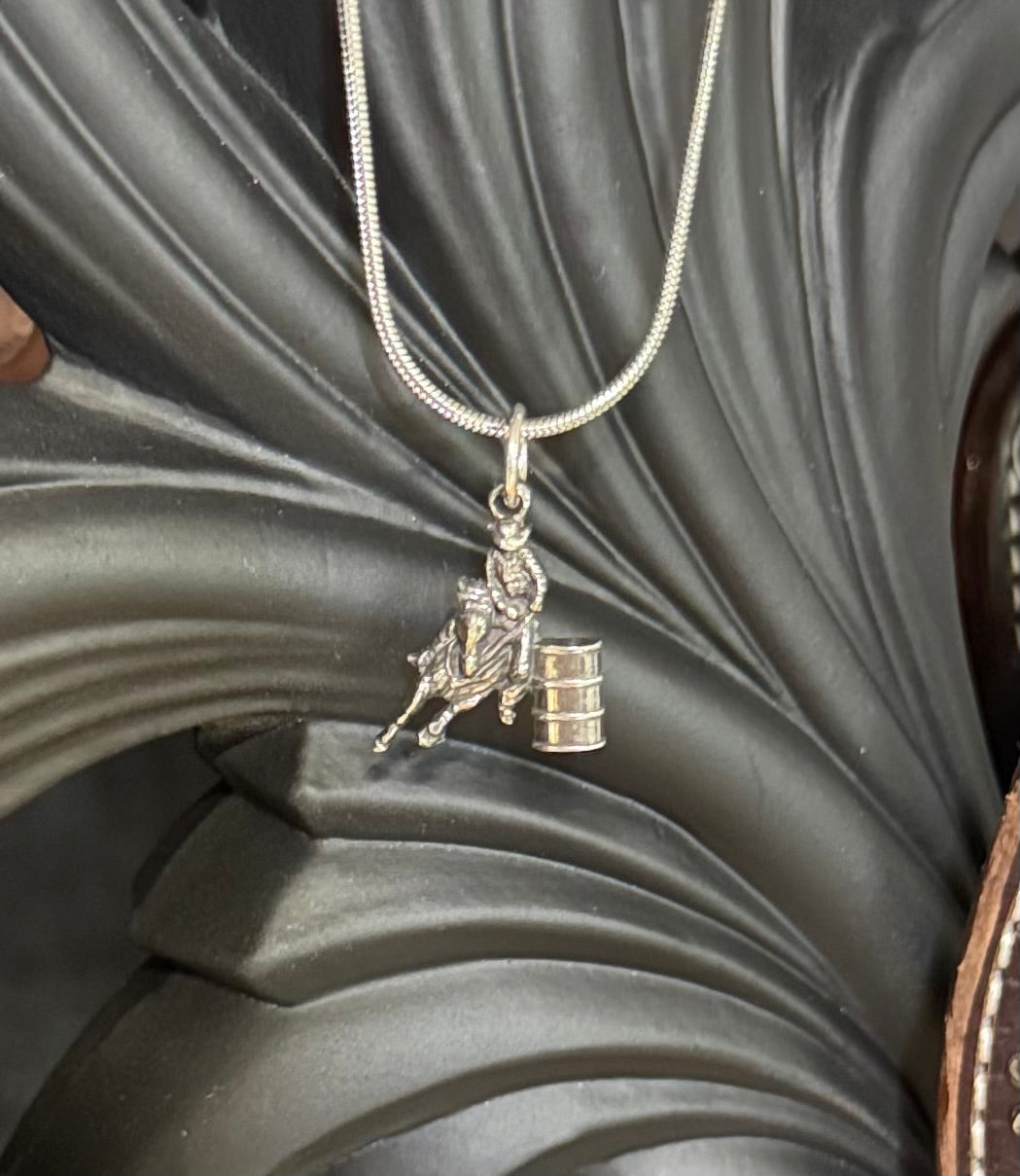 Barrel racer pendant, chain included.