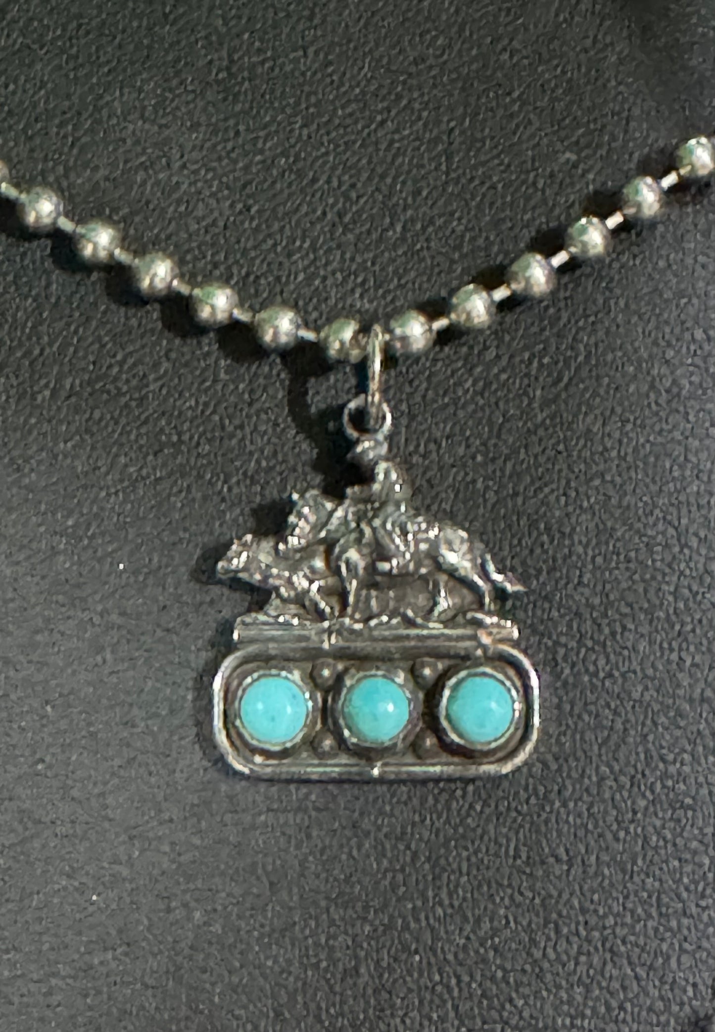 Cow horse on 3 turquoise