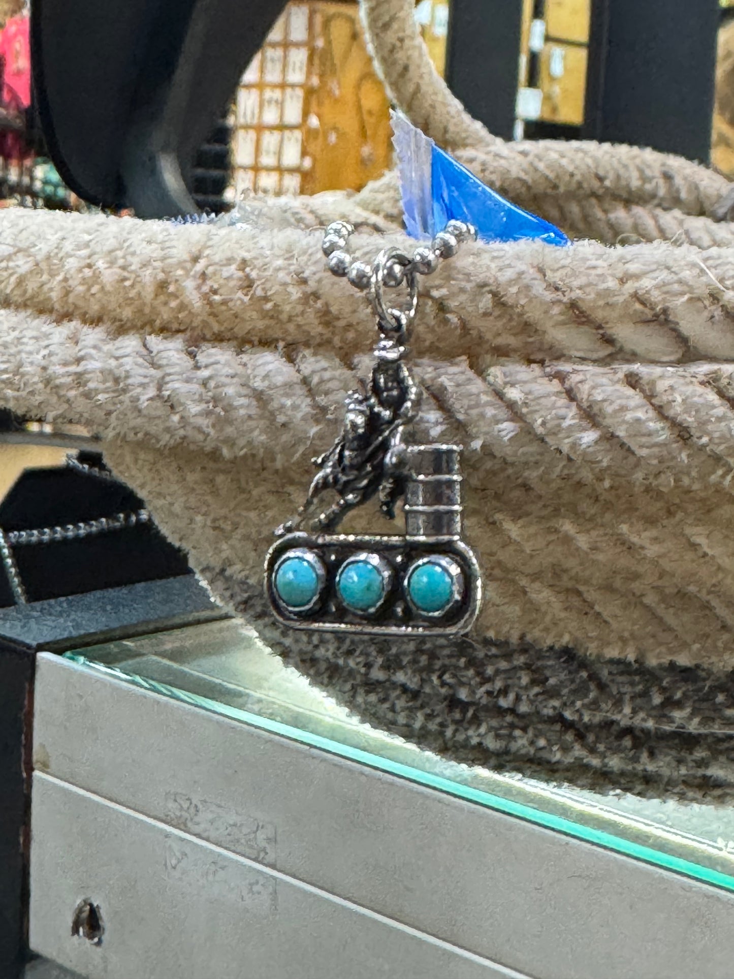 Barrel racer on 3 turquoise