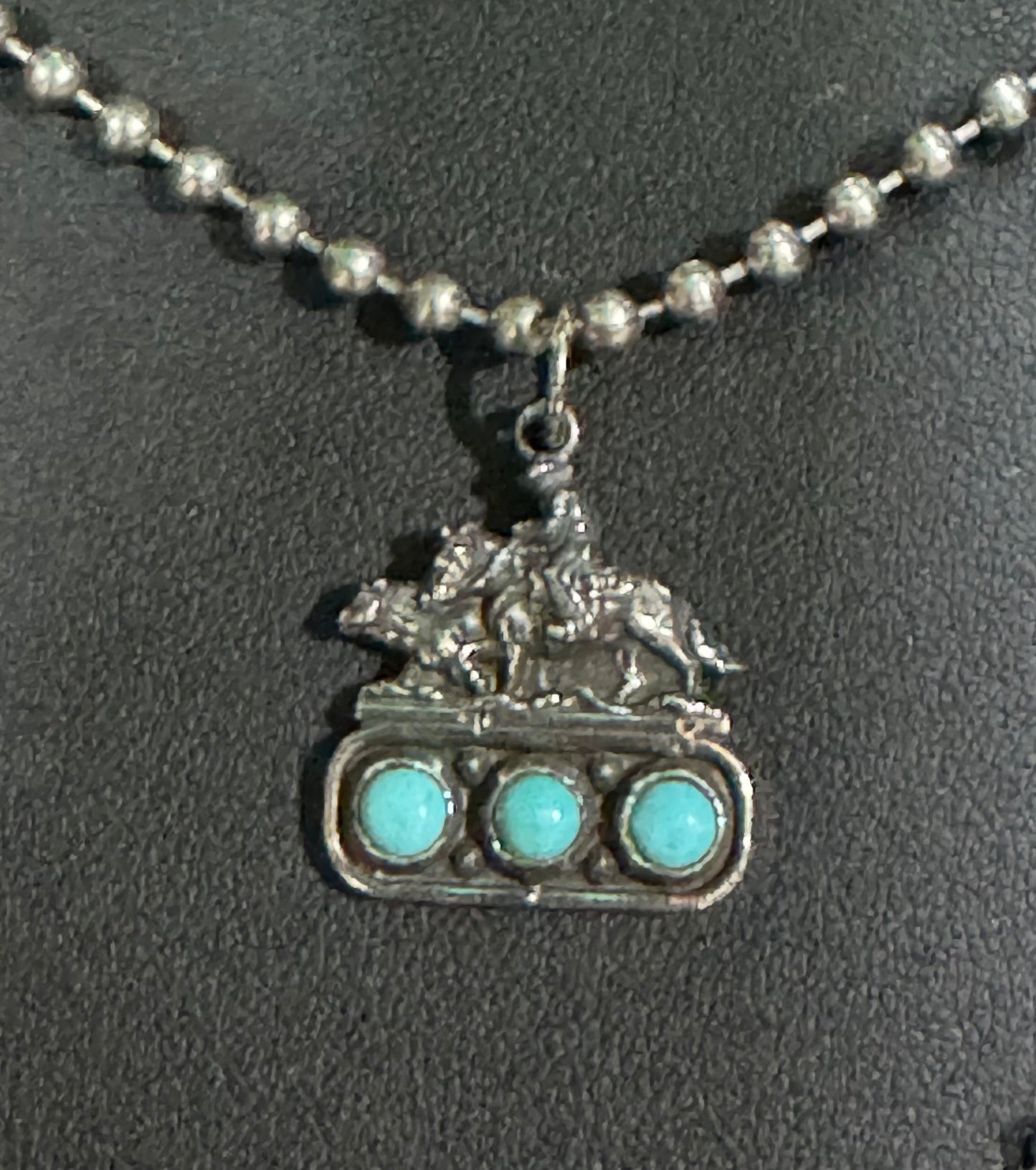 Cow horse on 3 turquoise