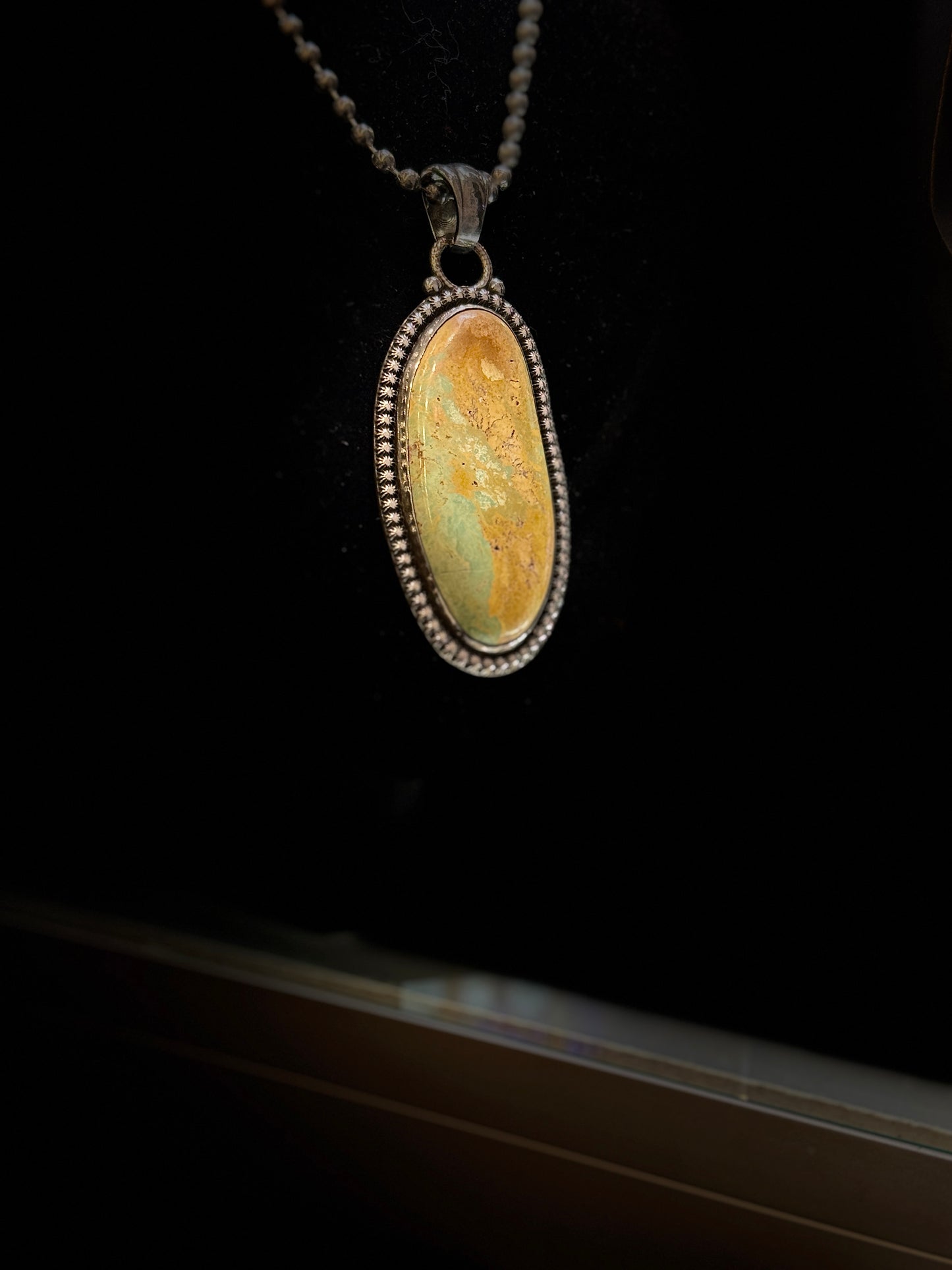Long oval turquoise pendant