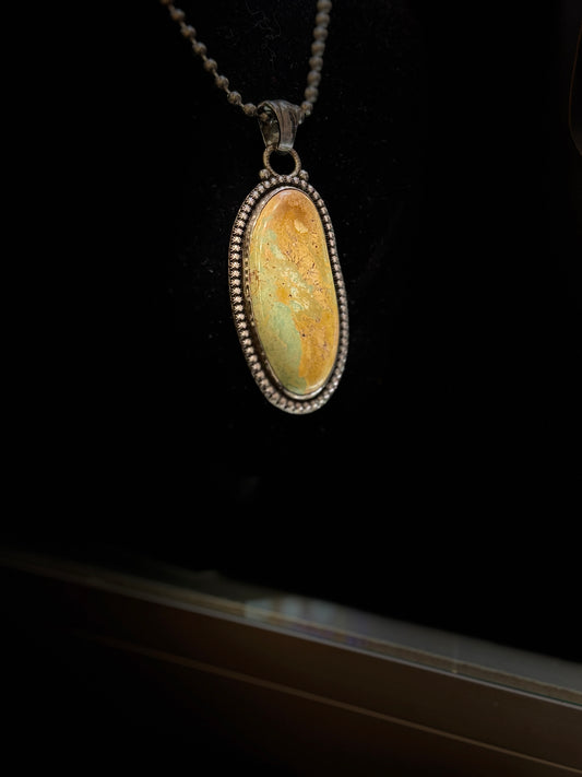 Long oval turquoise pendant