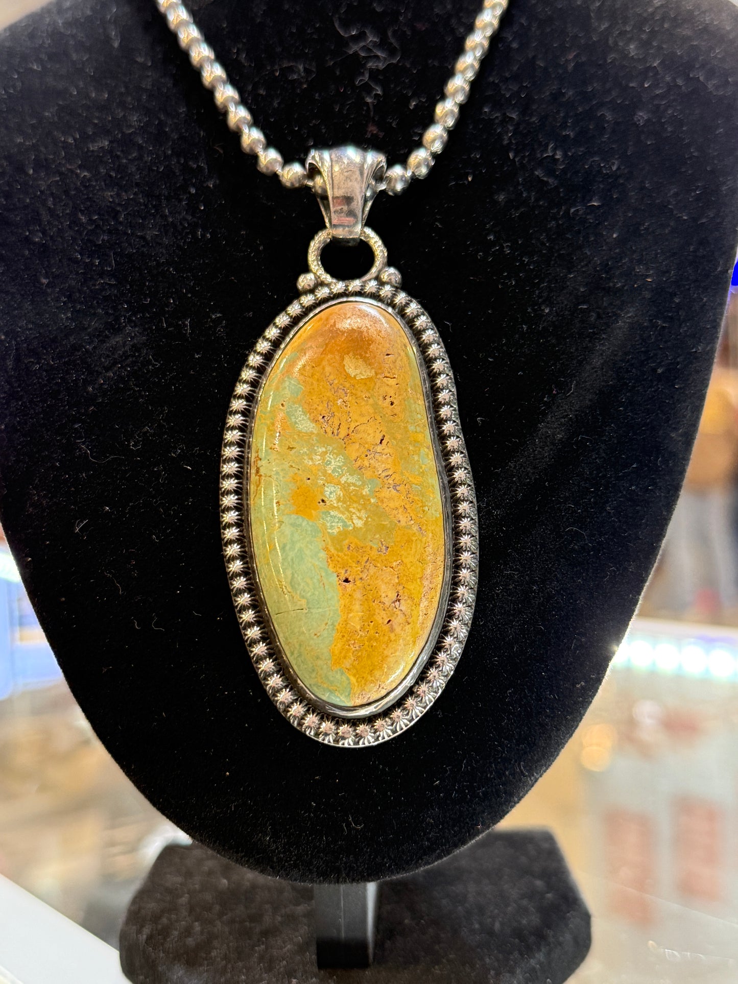 Long oval turquoise pendant