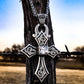 The "King Knight Cross" Pendant is a stunning handmade large sterling silver cross that features a 10mm a beautifully hand carved decorative bezel set cubic zirconia or Kingman stone along with a western style overlaid hand engraved scrolling throughout the entire cross. The cross measures at 3" X 2".