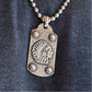 Rockin Out Jewelry's "Indian Head" Dog Tag is a custom solid sterling silver pendant that has rich American West history. Featuring the overlaid Indian head chief along with antique nail heads accented by the western style engraving. This dog tag is standard size measuring 1" x 2".
